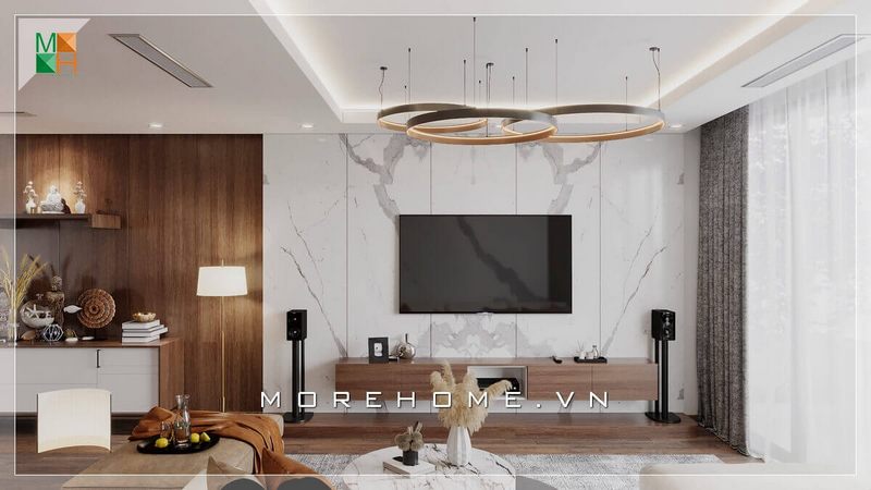 .
Thiết kế phòng khách đơn giản nhưng hiện đại, không quá phức tạp nhưng vẫn có thể gây ấn tượng cho bất cứ vị khách nào khi bước vào ngôi nhà của bạn. Tivi treo tường độc đáo, ốp tường gỗ kết hợp với đá ốp vân mây tạo nên không gian phòng khách trẻ trung mà ấn tượng, nội thất không quá nhiều nhưng vẫn đủ để sử dụng.